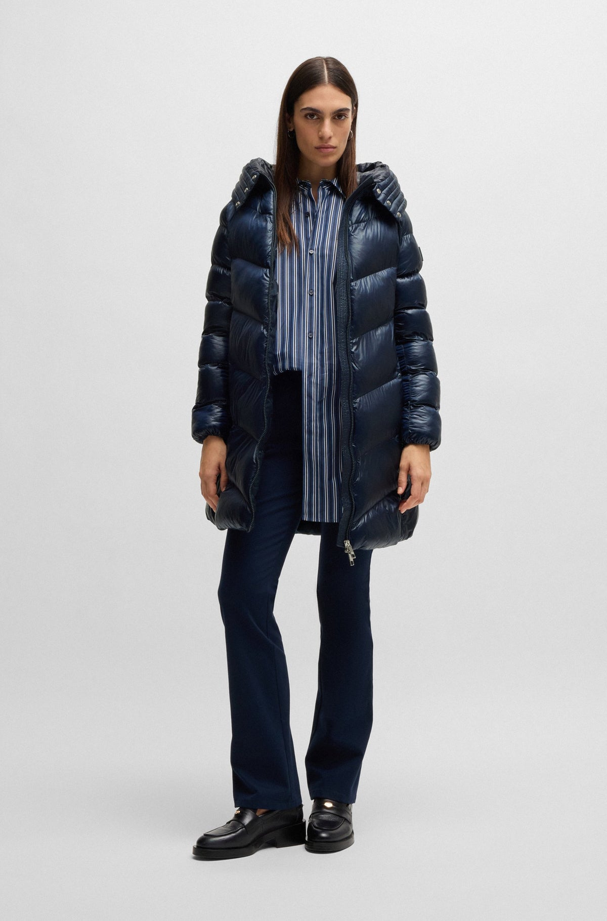 Casaco acolchoado e repelente à água com acabamentos polidos