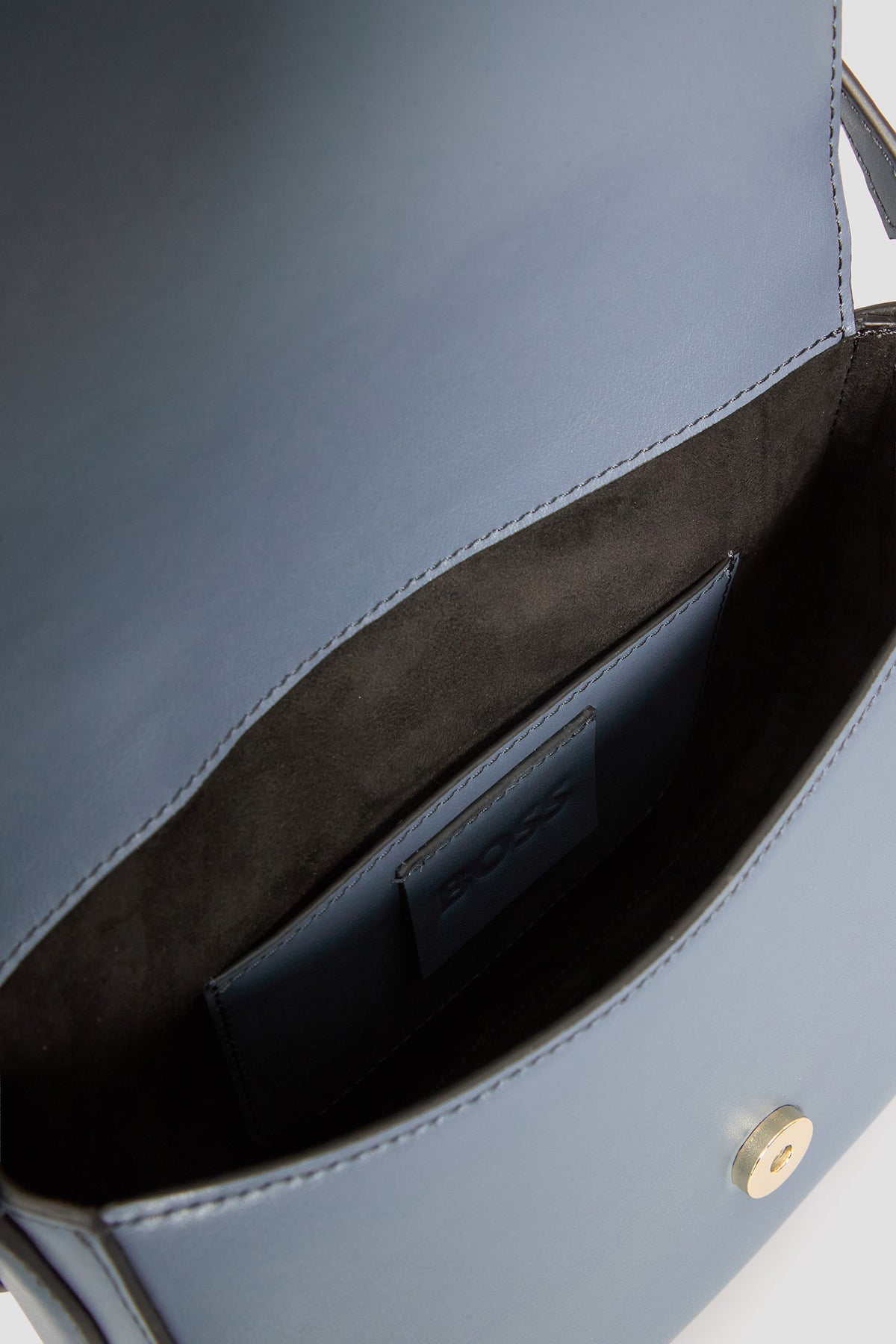 Mala a tiracolo com letras de logótipo