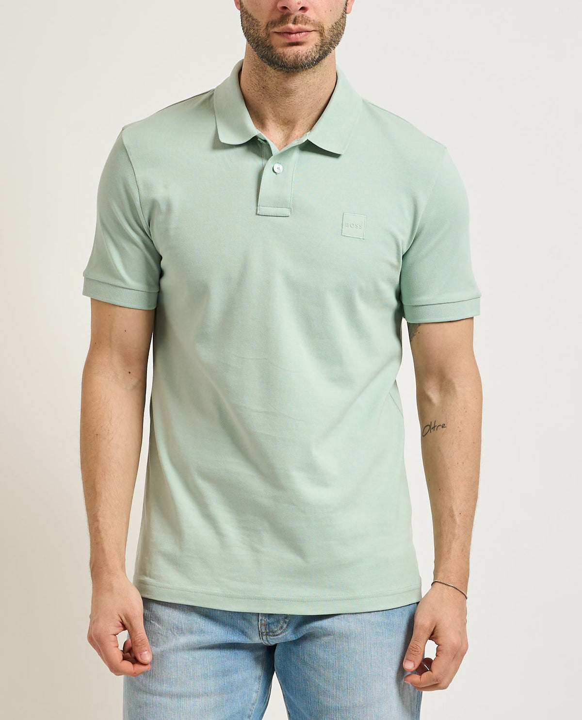 Polo slim-fit em algodão elástico com emblema com logótipo