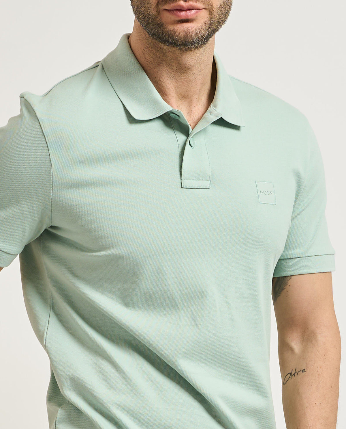 Polo slim-fit em algodão elástico com emblema com logótipo