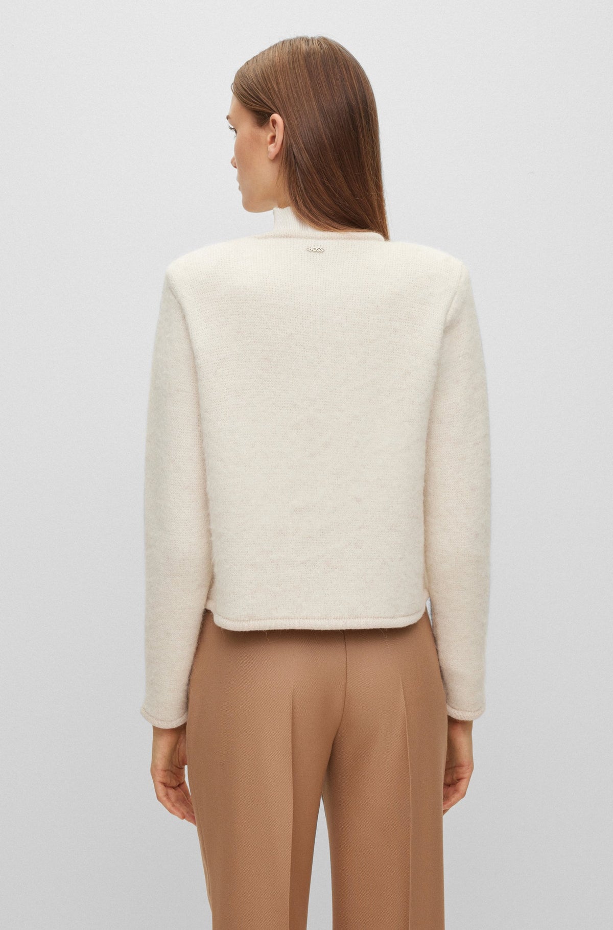 Casaco numa mistura de lã com detalhes metalizados