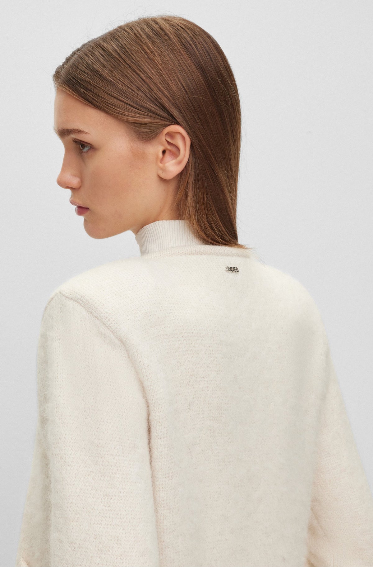 Casaco numa mistura de lã com detalhes metalizados