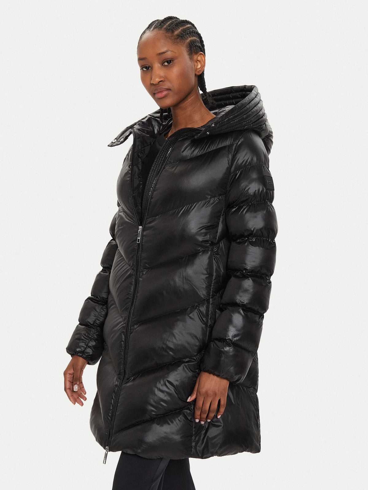 Casaco acolchoado e repelente à água com acabamentos polidos