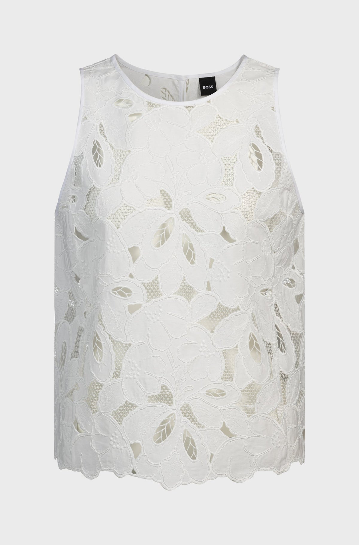 Blusa feita em bordado inglês de mistura de algodão