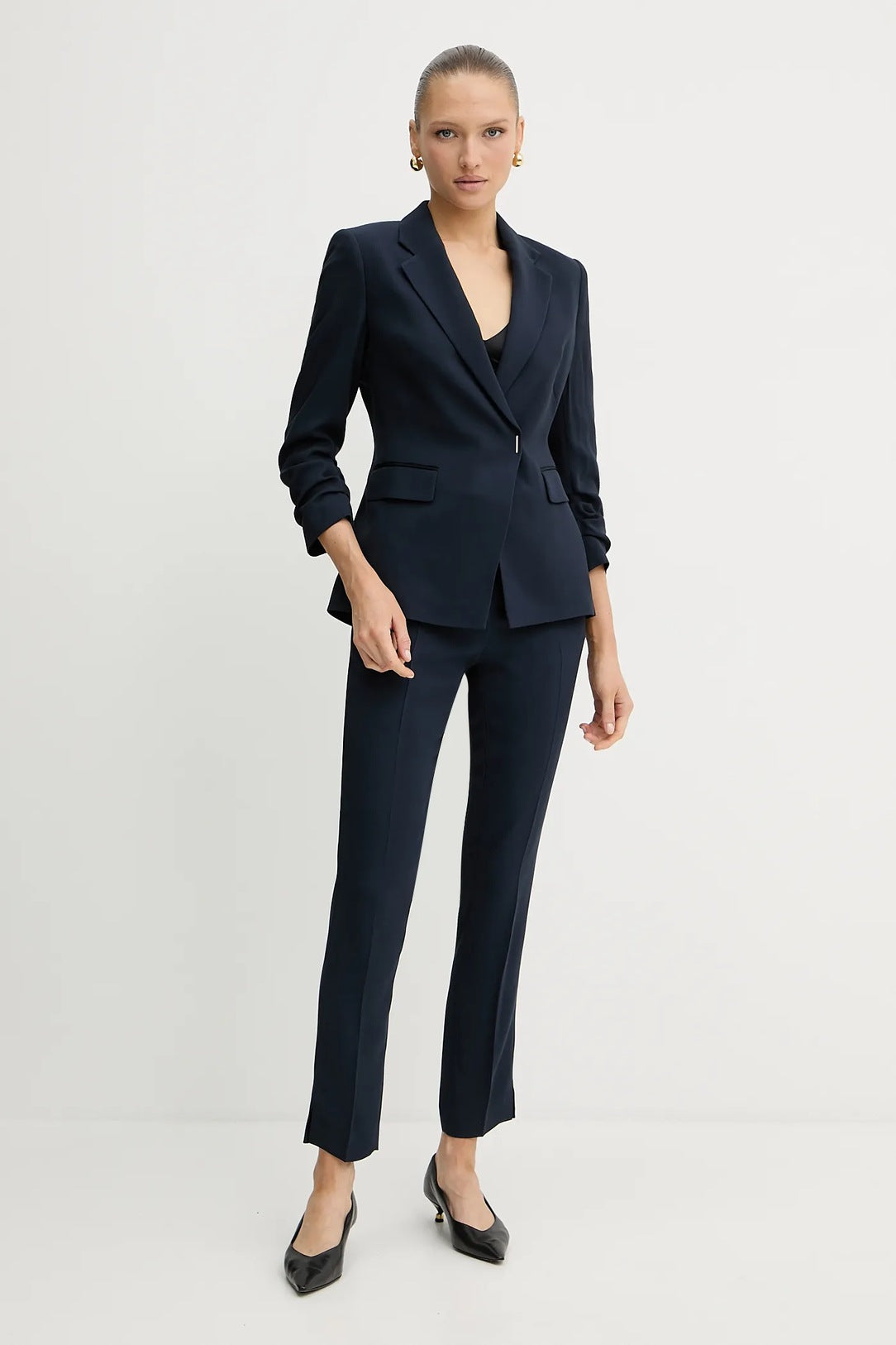 Calças de ajuste slim em tecido Punto Milano elástico