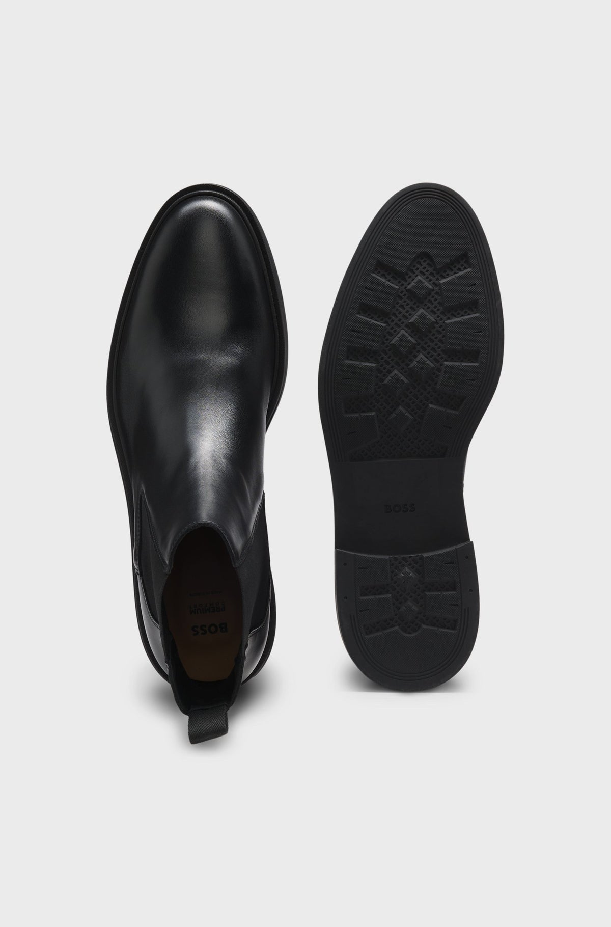 Botas Chelsea em pele polida com costuras de assinatura
