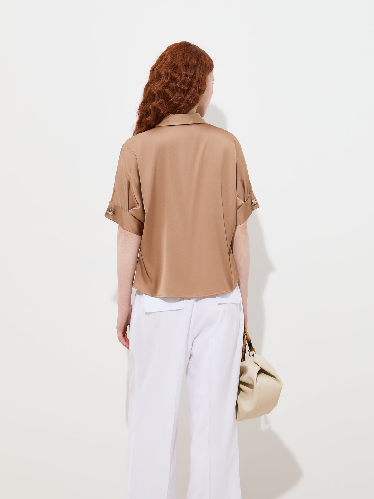 Blusa fluida com laçada