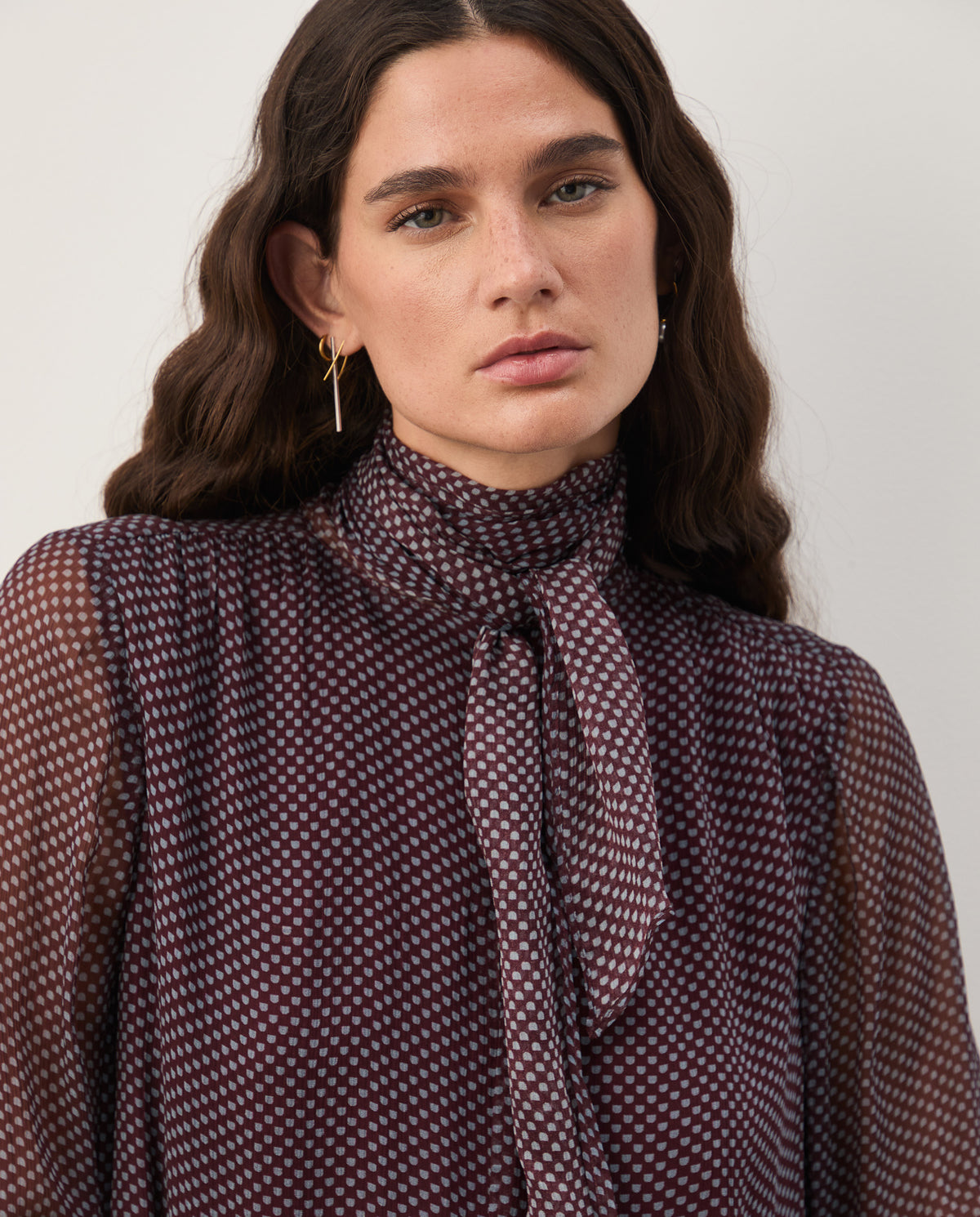 Blusa estampada com laçada