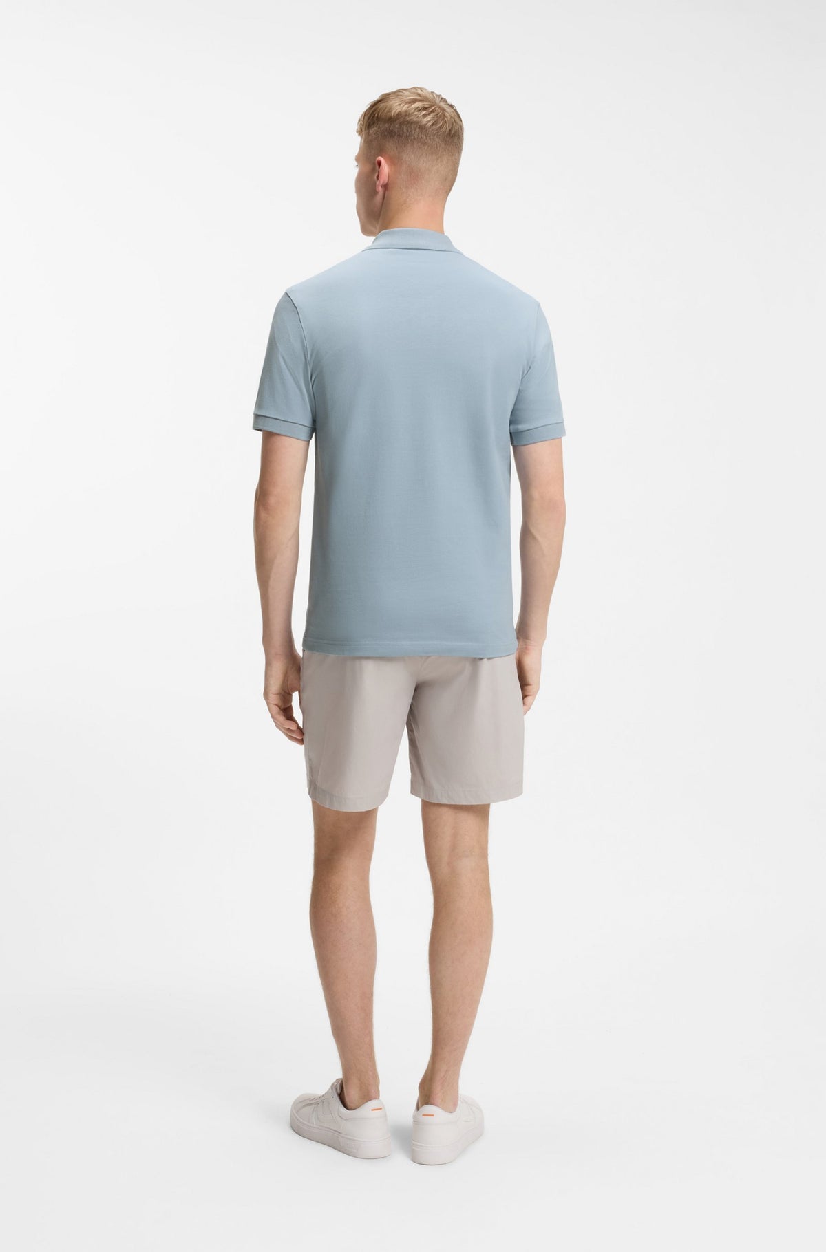 Polo de ajuste slim em algodão elástico com emblema com logótipo
