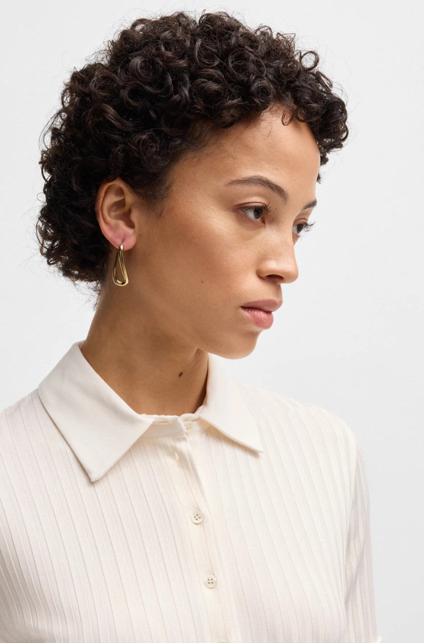 Polo em tecido texturizado