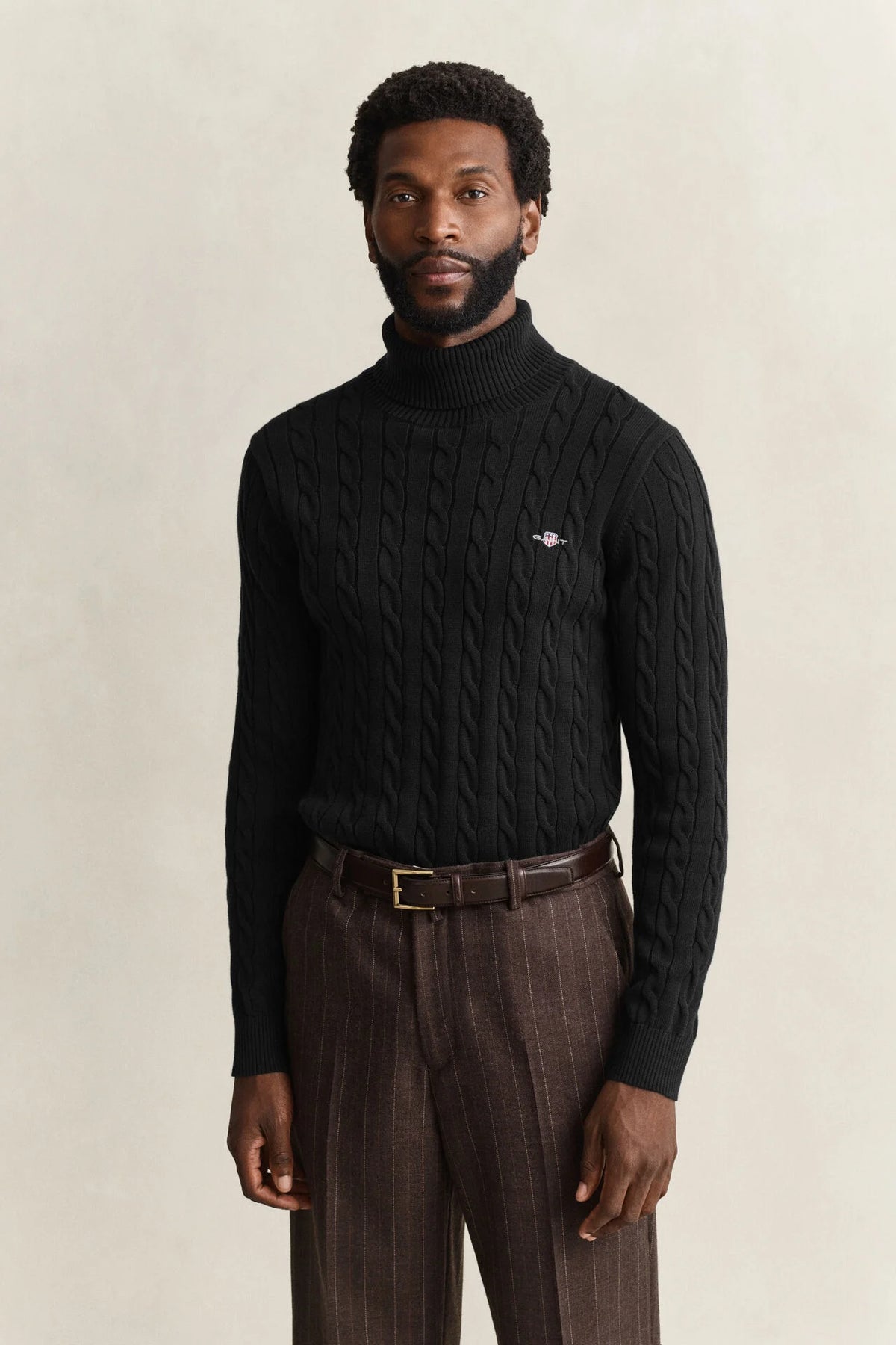 Camisola de gola alta em malha entrançada de algodão